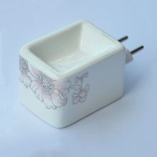 AROMATIZADOR ELETRICO COM TOMADA FLORES ROSA CLARO